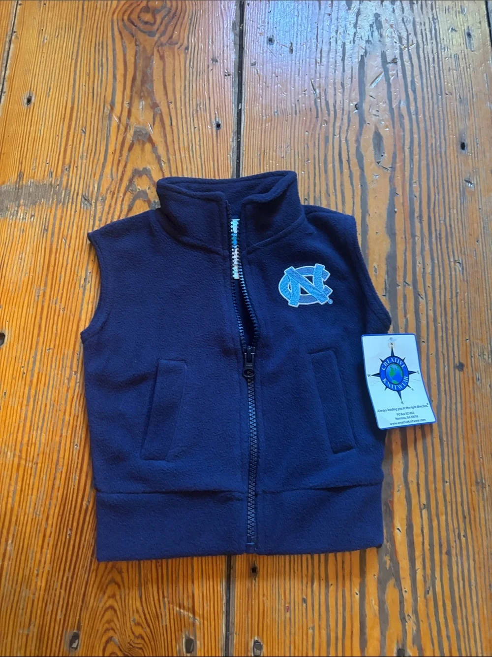 Navy Fleece Vest with Light Blue UNC Logo